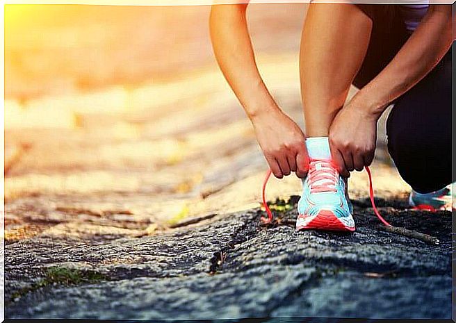 Putting on sneakers for exercise