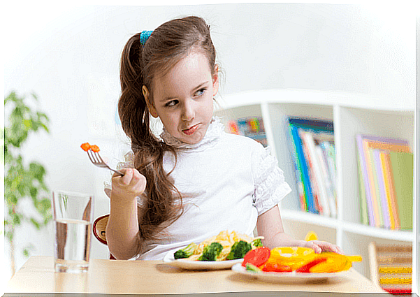 Girl refusing food for food neophobia