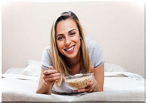 Woman eating cereal