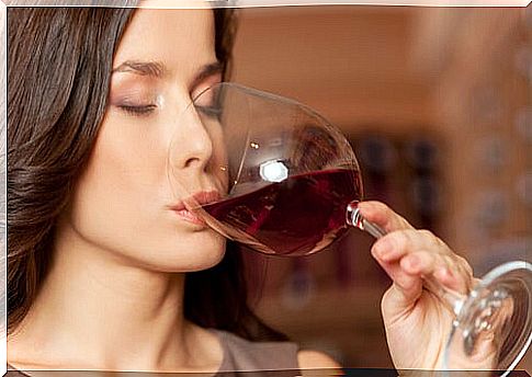 Woman drinking a glass of wine